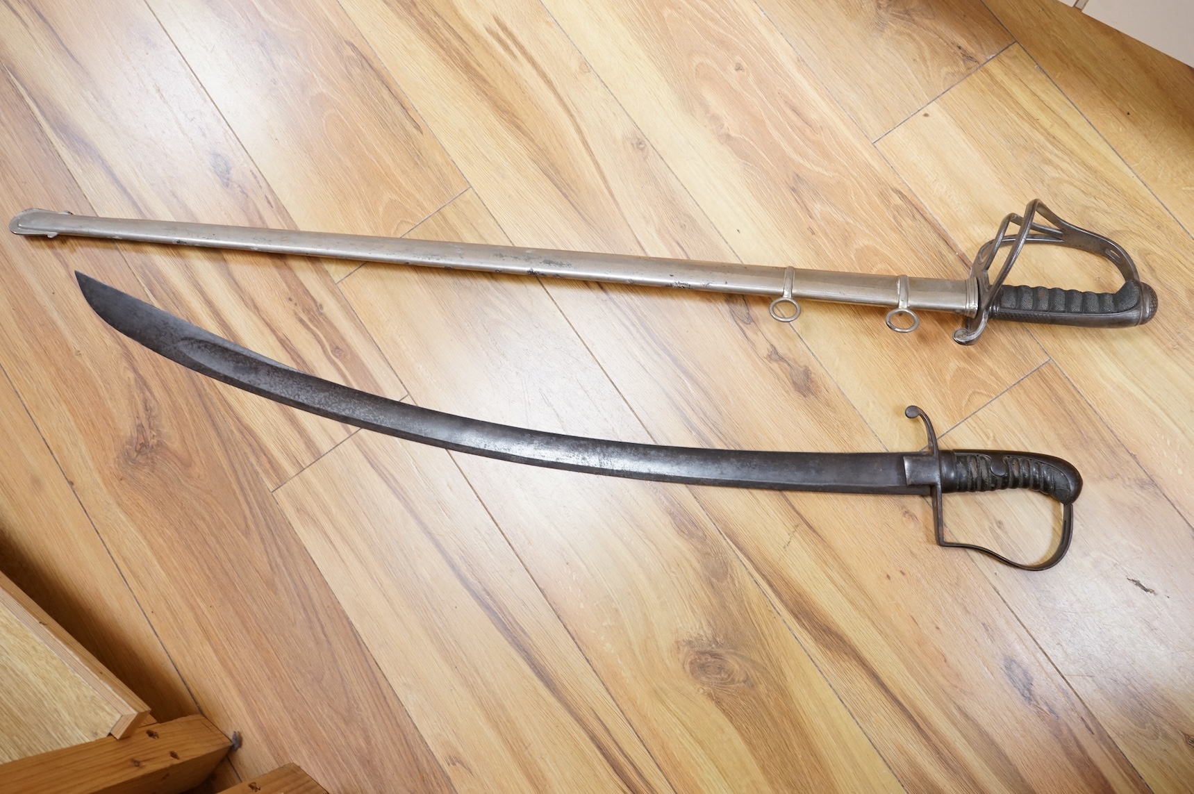 A 1796 pattern cavalry officer’s sword, blade etched J. Runkel, Solingen, regulation blade, in fair condition, grip wormed, together with an 1822 pattern sword blade, etched; Honourable Horse Artillery Company, moderatel